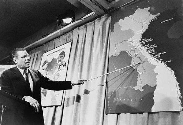 Image: Photo of Secretary of Defense McNamara at a press conference taken by Marion S. Trikosko, 1965. From the Library of Congress.