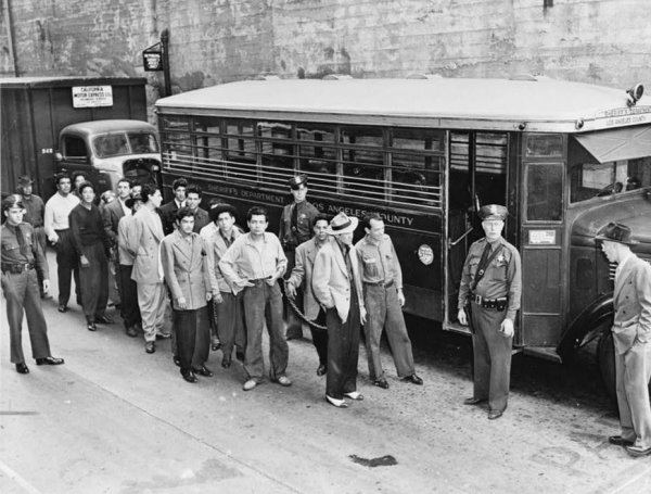 Image: Zoot suiters lined up outside Los Angeles jail after riots